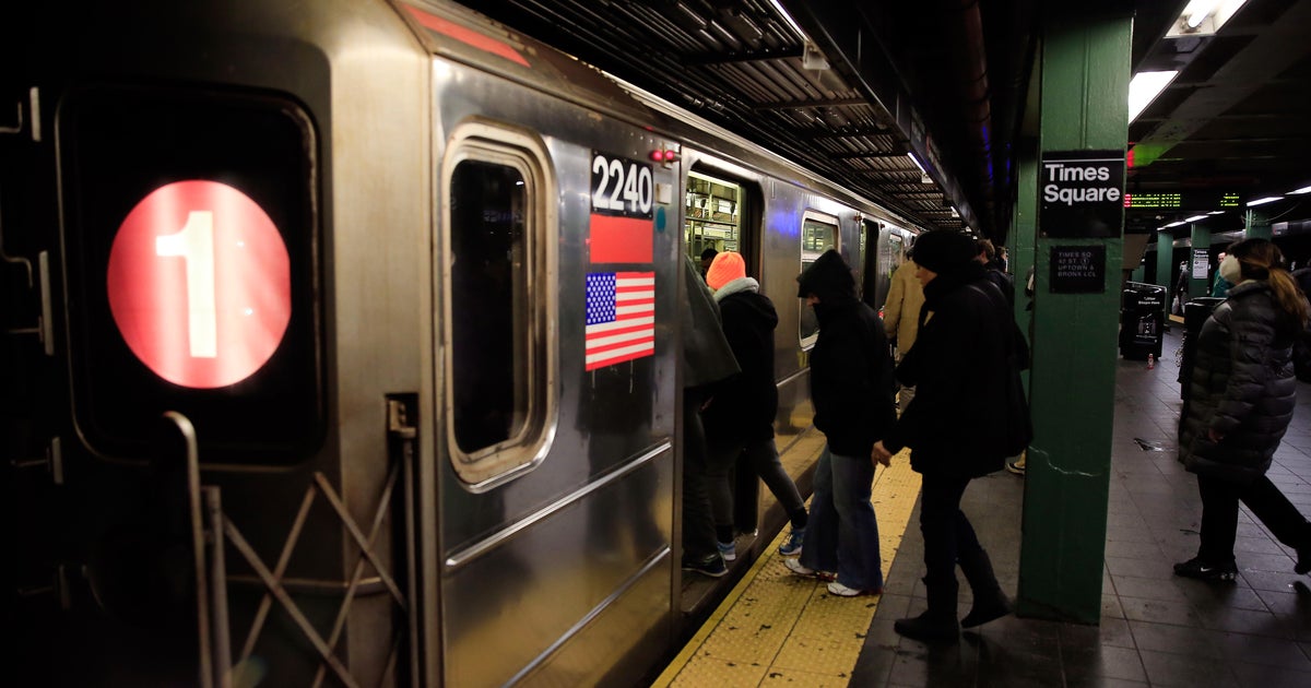 Woman killed after being shoved in front of NYC subway train - CBS News
