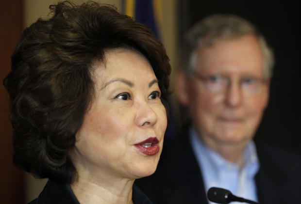 Elaine Chao and Mitch McConnell 