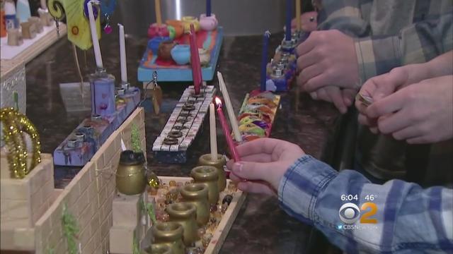 families-celebrate-first-night-of-chanukah.jpg 