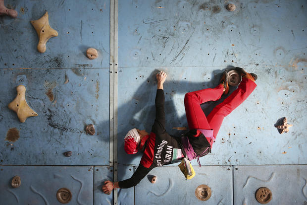 Iranian rock climber Farnaz Esmaeilzadeh scales a climbing gym in the city of Zanjan, some 207 miles west of the capital Tehran, Iran, Jan. 18, 2016. Esmaeilzadeh, 27, who has been climbing since she was 13, has distinguished herself in international comp 