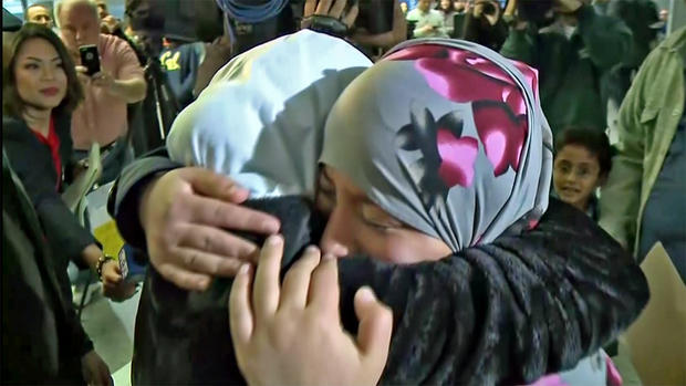 Yemeni Girls Embrace at SFO after Eman Ali (right) Returns 