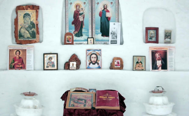 In this image made from video, the inside of a chapel made of snow is seen in Sosnovka, Russia, Feb. 8, 2017. 