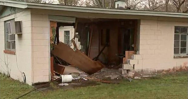 Florida woman dead after SUV crashes into home as she watched TV - CBS News