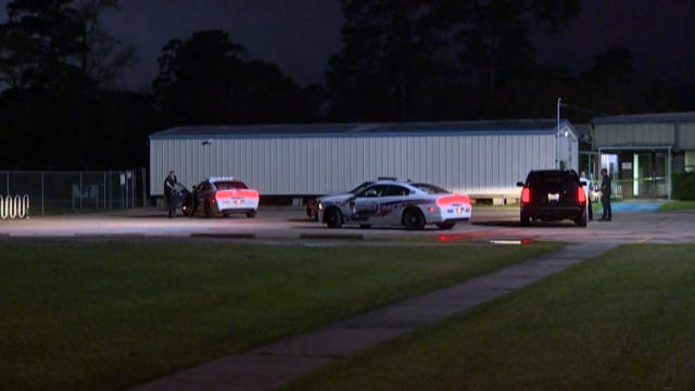 Crews work the scene after a body was found at an elementary school in Atascocita, Texas, on March 9, 2017. 