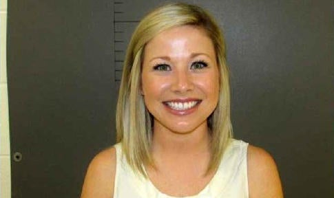 Sarah Fowlkes is seen in a police booking photo provided to CBS affiliate KEYE-TV.
