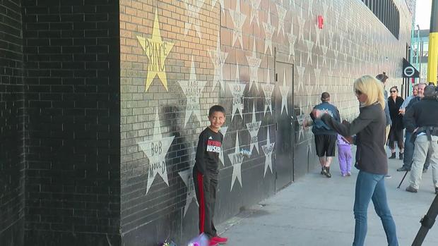Young Prince Fan Takes Photo At His First Avenue Star 