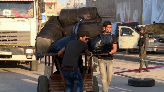 ctm-0516-homs-syria-doane-broll-rebels-boarding-bus.jpg 