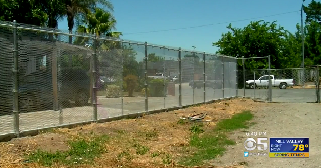 Crews build controversial fence near homeless encampment in San Jose ...