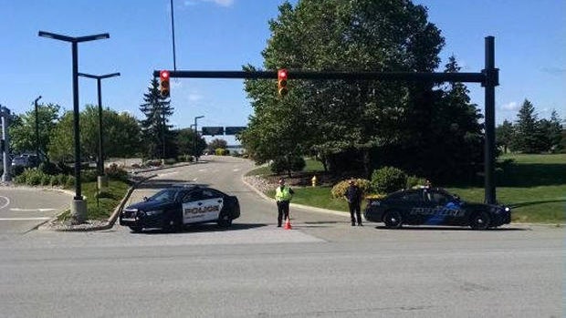 Police block a street leading to Bishop International Airport in Flint, Michigan, after an airport police officer was stabbed on June 21, 2017. 