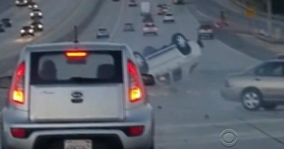 Apparent road-rage accident flips truck; survivor speaks out - CBS News