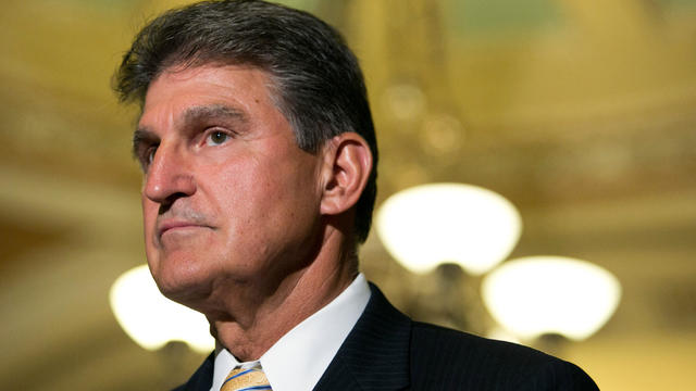 Sen. Joe Manchin, D-West Virginia, speaks during a press conference after meeting with fellow Democratic senators on Capitol Hill July 9, 2013, in Washington. 