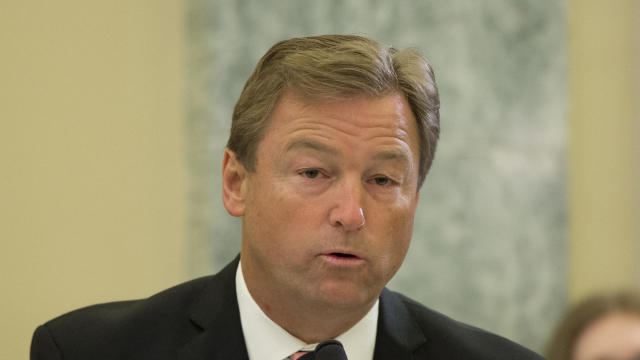 In this April 2, 2014, photo, Sen. Dean Heller, R-Nev., questions General Motors CEO Mary Barra on Capitol Hill in Washington before the Senate Commerce, Science and Transportation Subcommittee. 