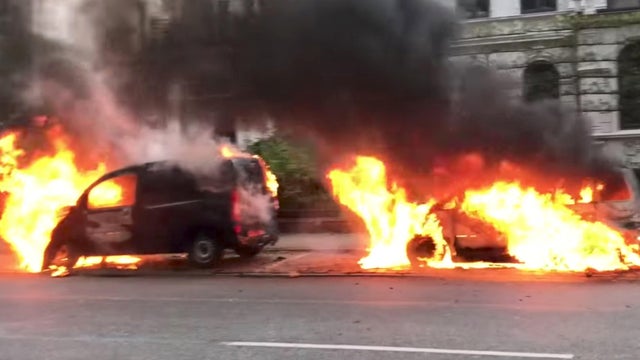 Cars are seen on fire during anti-G-20 protests in Hamburg, Germany, July 7, 2017, in this picture obtained from social media. 