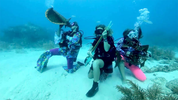 Divers Jam at The Lower Keys Underwater Music Festival near Big Pine Key, Florida 