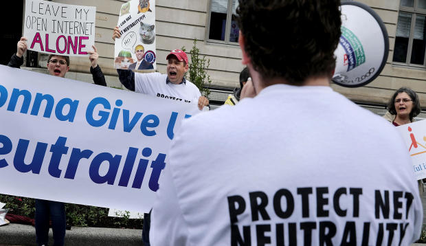 Proponents of net neutrality protest against Federal Communication Commission Chairman Ajit Pai outside the American Enterprise Institute before his arrival May 5, 2017, in Washington. 