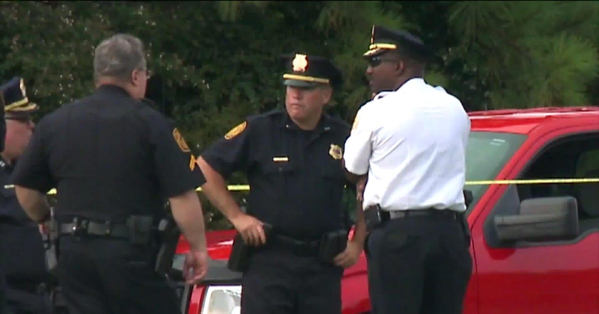 Police killed woman after she shot husband at car crash scene ...