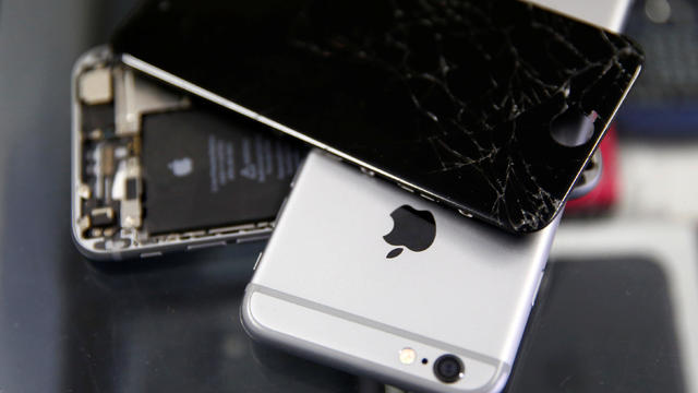 Broken Apple iPhones are seen in a repair shop in Vienna, Austria, July 4, 2017. 