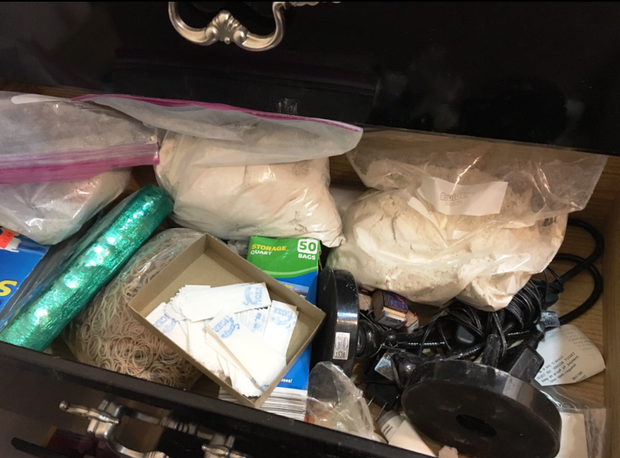 Loose Heroin, Kilogram Brick of Heroin and Packaging Material Found at H... 