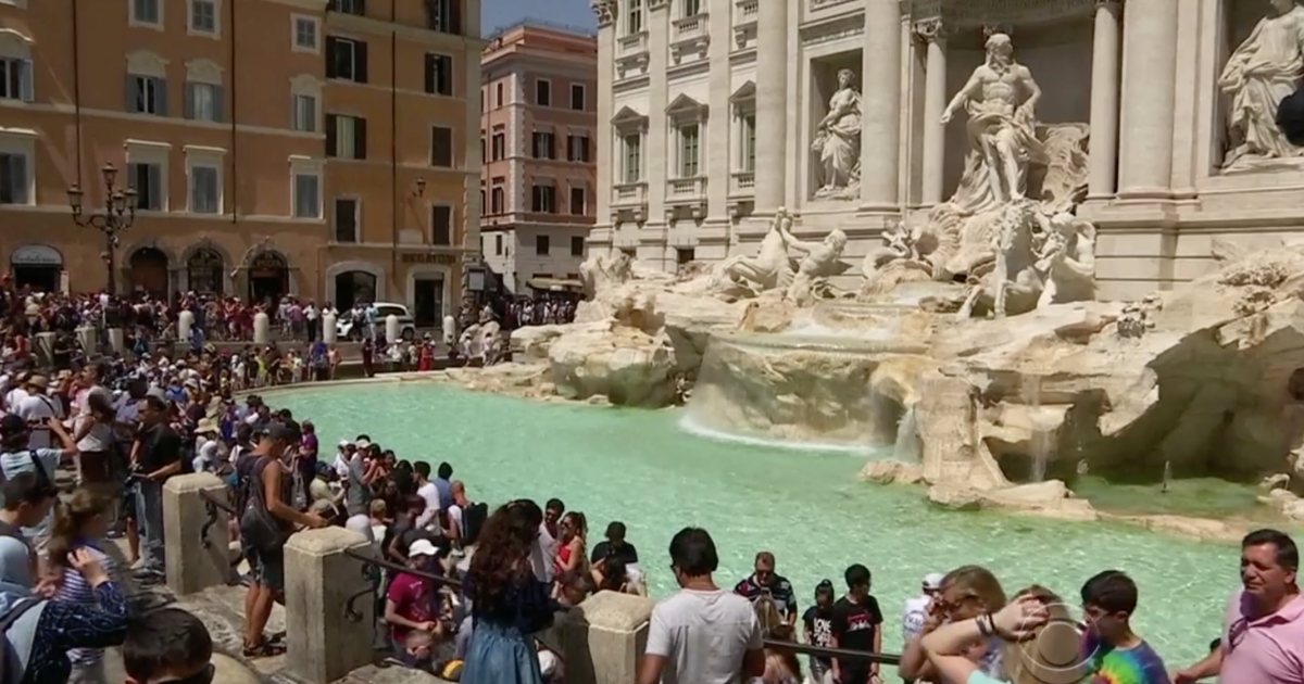 Woman captured on video climbing Rome’s Trevi Fountain to fill up water bottle
