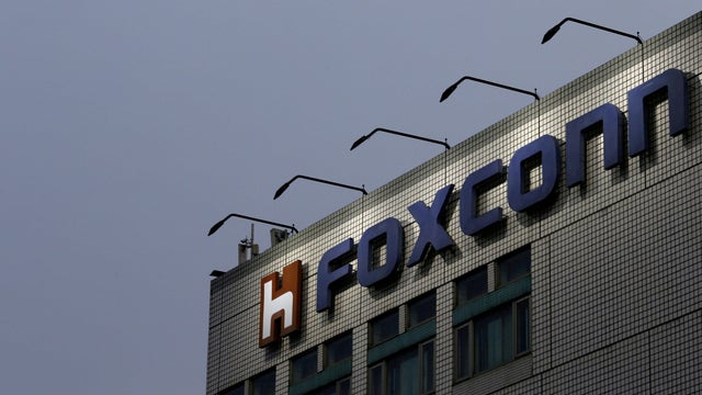 FILE PHOTO - The logo of Foxconn on top of the company's headquarters in New Taipei City Taiwan 