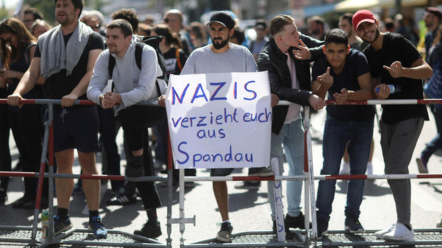 People protest against a far-right activist demonstration commemorating the suicide of Germany's former Deputy Furher Rudolf Hess 30 years ago, in Berlin 