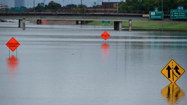 FILE PHOTO:    Houses and cars are seen partially submerged by flood waters from tropical storm Harvey in east Houston 