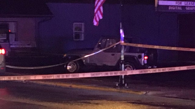 Crews work the scene after an officer-involved shooting in New Carlisle, Ohio, on Sept. 4, 2017. 