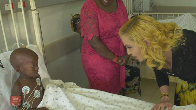 madonna-with-patient-at-malawi-hospital-promo.jpg 