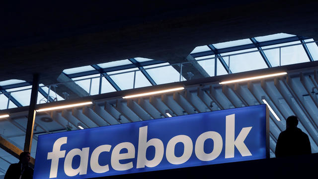 Facebook logo is seen  at a start-up companies gathering at Paris' Station F in Paris 
