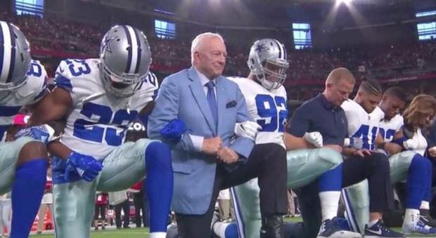 Cowboys kneel 