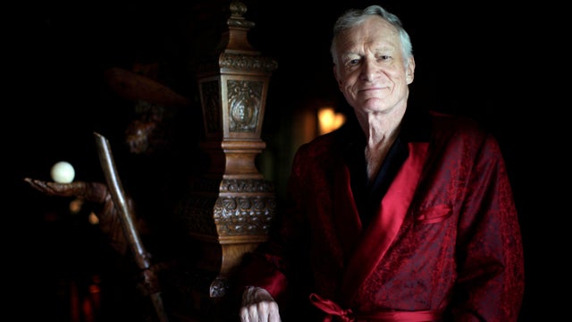 FILE PHOTO -  Playboy magazine founder Hugh Hefner poses for a portrait at his Playboy mansion in Los Angeles 