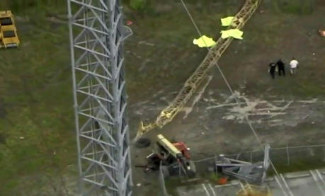Aerial footage shows crews working the scene after three workers fell from a transmission tower in Miami Gardens, Florida, on Sept. 27, 2017. 