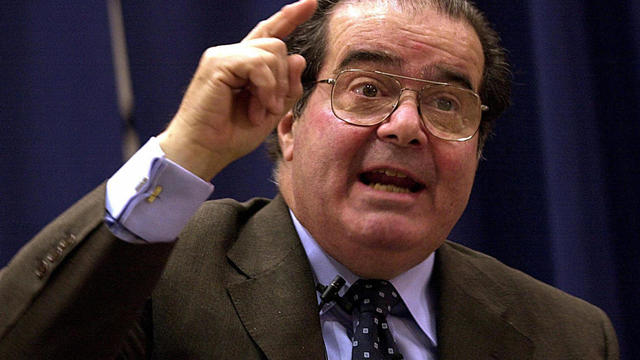 WASHINGTON, UNITED STATES: US Supreme Court Justice Antonin Scalia speaks during a conversation with Justice Stephen Breyer on the relevance of foreign law for American constitutional adjudication at American University's law college in Washington 13 January 2005. AFP PHOTO/Nicholas KAMM (Photo credit should read NICHOLAS KAMM/AFP/Getty Images) 