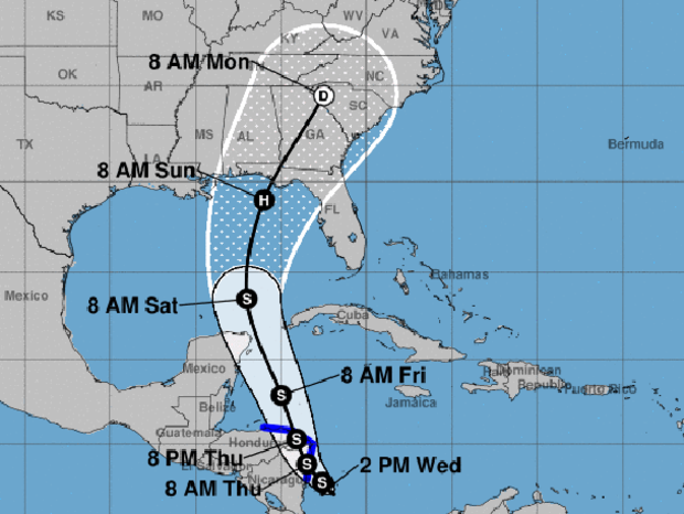 A map from the National Hurricane Center shows the probable path of a tropical depression that could be the next Atlantic tropical storm. The S stands for tropical storm. The H stands for hurricane. The blue lines show areas under tropical storm warnings. 