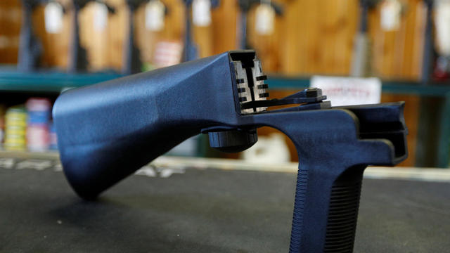 A bump fire stock that attaches to a semi-automatic rifle to increase the firing rate is seen at Good Guys Gun Shop in Orem 
