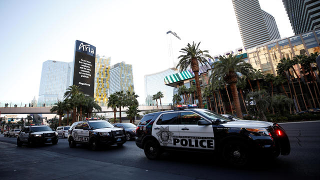 Police vehicles line Las Vegas Boulevard following the mass shooting in Las Vegas 