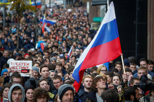 Supporters of Russian opposition leader Alexei Navalny attend a rally in Moscow 