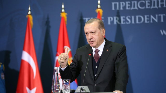 Turkish President Recep Tayyip Erdogan gestures as he speaks during a joint press conference with Serbia's President Aleksandar Vucic after their meeting in Belgrade 