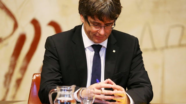 Catalan President Carles Puigdemont presides over a cabinet meeting at the regional government headquarters, the Generalitat, in Barcelona 