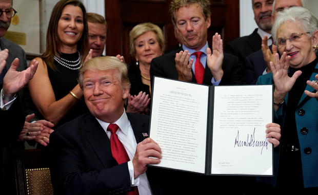 Trump signs an Executive Order on healthcare at the White House in Washington 