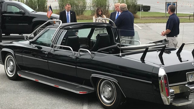 Members of the Secret Service Uniformed Division patrol alongside the security fence around the perimeter of the White House in Washington March 18, 2017. 