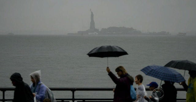 Heavy rain and severe storms batter East Coast - CBS News