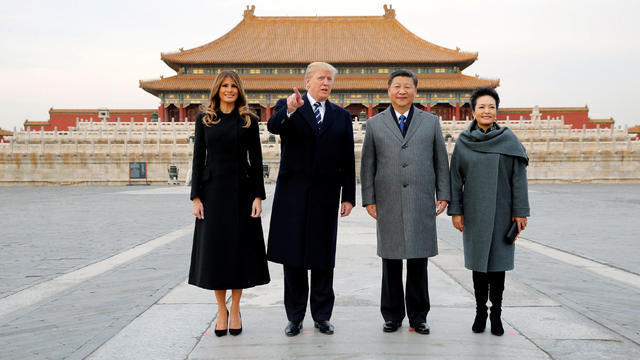 U.S. President Donald Trump and first lady Melania arrive on Air Force One at Beijing 