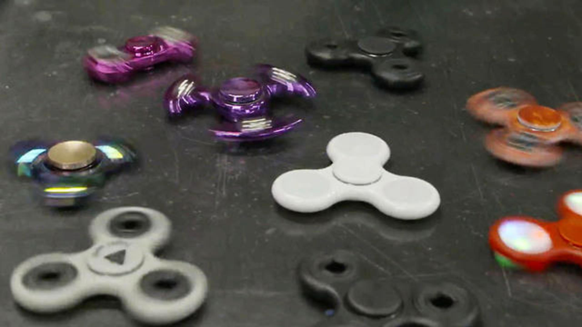 fidget spinners high levels lead, finds - CBS News