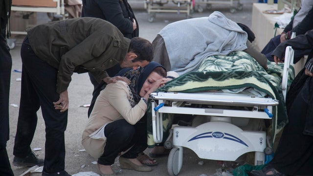 A man reacts following an earthquake in Sarpol-e Zahab county in Kermanshah 