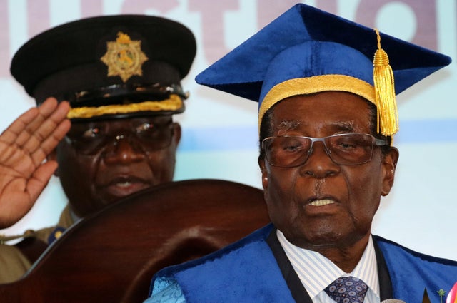 Zimbabwe President Robert Mugabe attends a university graduation ceremony in Harare 