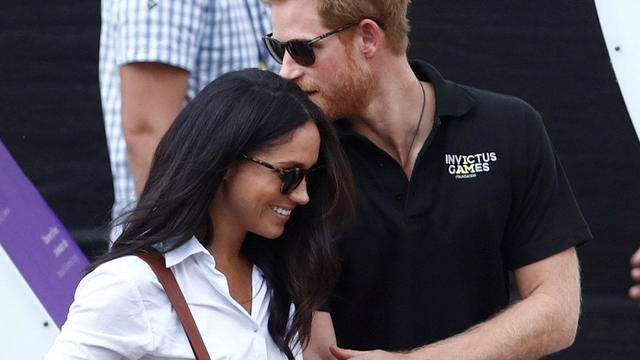 FILE PHOTO: Britain's Prince Harry arrives with girlfriend Markle at the wheelchair tennis event during the Invictus Games in Toronto 