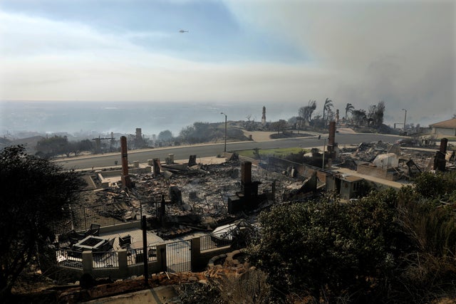 Remains of homes seen after wind-driven wildfire in Ventura, California