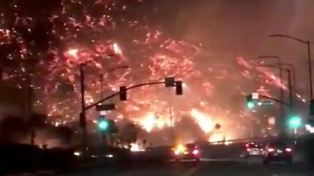 Flames of a wildfire in 405 highway in Los Angeles 