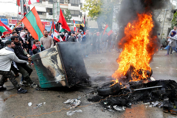 Protesters are seen near the U.S. embassy in Awkar, in Beirut 